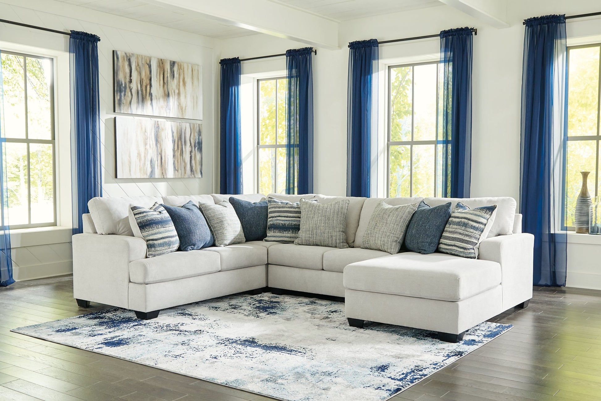 Lowder 4-Piece Sectional with Ottoman Smyrna Furniture Outlet