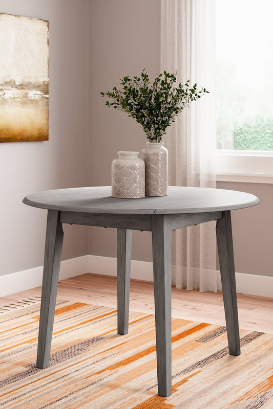 Shullden Round DRM Drop Leaf Table Smyrna Furniture Outlet