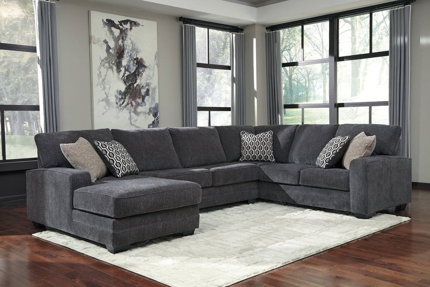 Tracling 3-Piece Sectional with Ottoman Smyrna Furniture Outlet