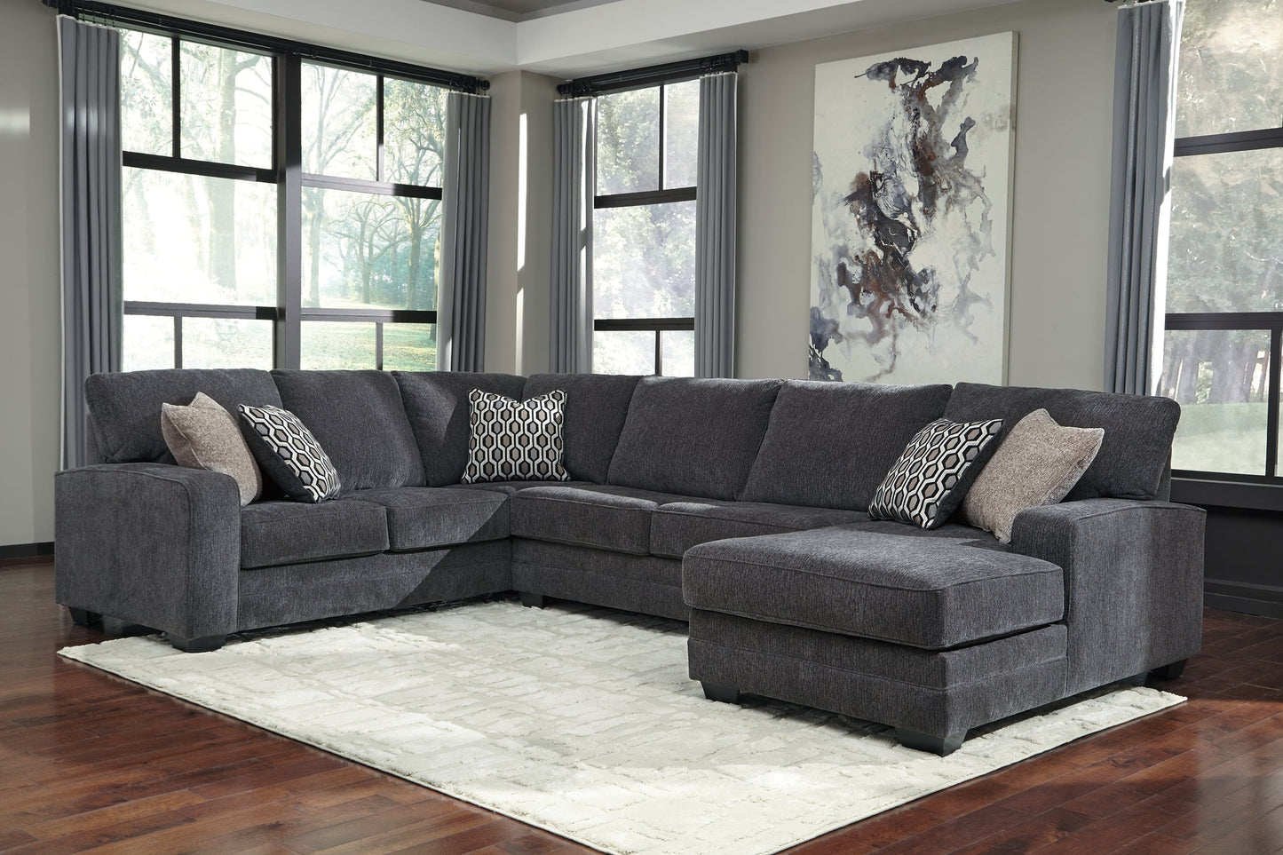 Tracling 3-Piece Sectional with Ottoman Smyrna Furniture Outlet