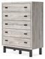 Vessalli Five Drawer Wide Chest Smyrna Furniture Outlet