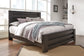 Brinxton King/California King Panel Headboard with Mirrored Dresser, Chest and Nightstand Smyrna Furniture Outlet