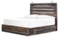 Drystan King Panel Bed with 4 Storage Drawers with Mirrored Dresser, Chest and Nightstand Smyrna Furniture Outlet