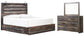 Drystan King Panel Bed with 4 Storage Drawers with Mirrored Dresser Smyrna Furniture Outlet