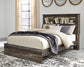 Drystan Queen Bookcase Bed with Mirrored Dresser, Chest and Nightstand Smyrna Furniture Outlet