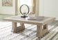 Hennington Coffee Table with 2 End Tables Smyrna Furniture Outlet