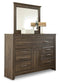 Juararo King/California King Panel Headboard with Mirrored Dresser Smyrna Furniture Outlet