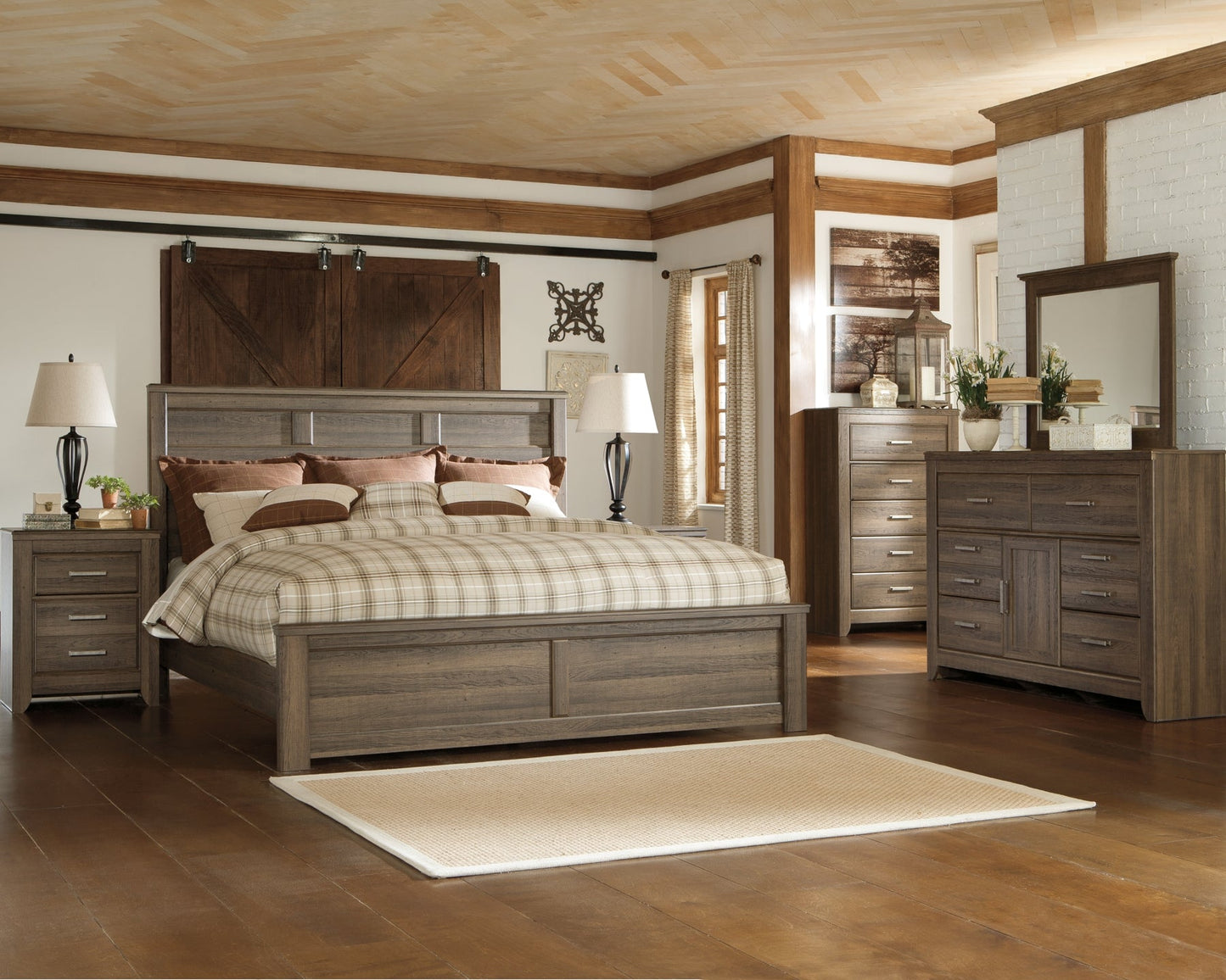 Juararo King Panel Bed with Mirrored Dresser, Chest and Nightstand Smyrna Furniture Outlet