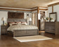 Juararo King Panel Bed with Mirrored Dresser, Chest and Nightstand Smyrna Furniture Outlet