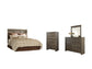 Juararo Queen Panel Headboard with Mirrored Dresser and Chest Smyrna Furniture Outlet